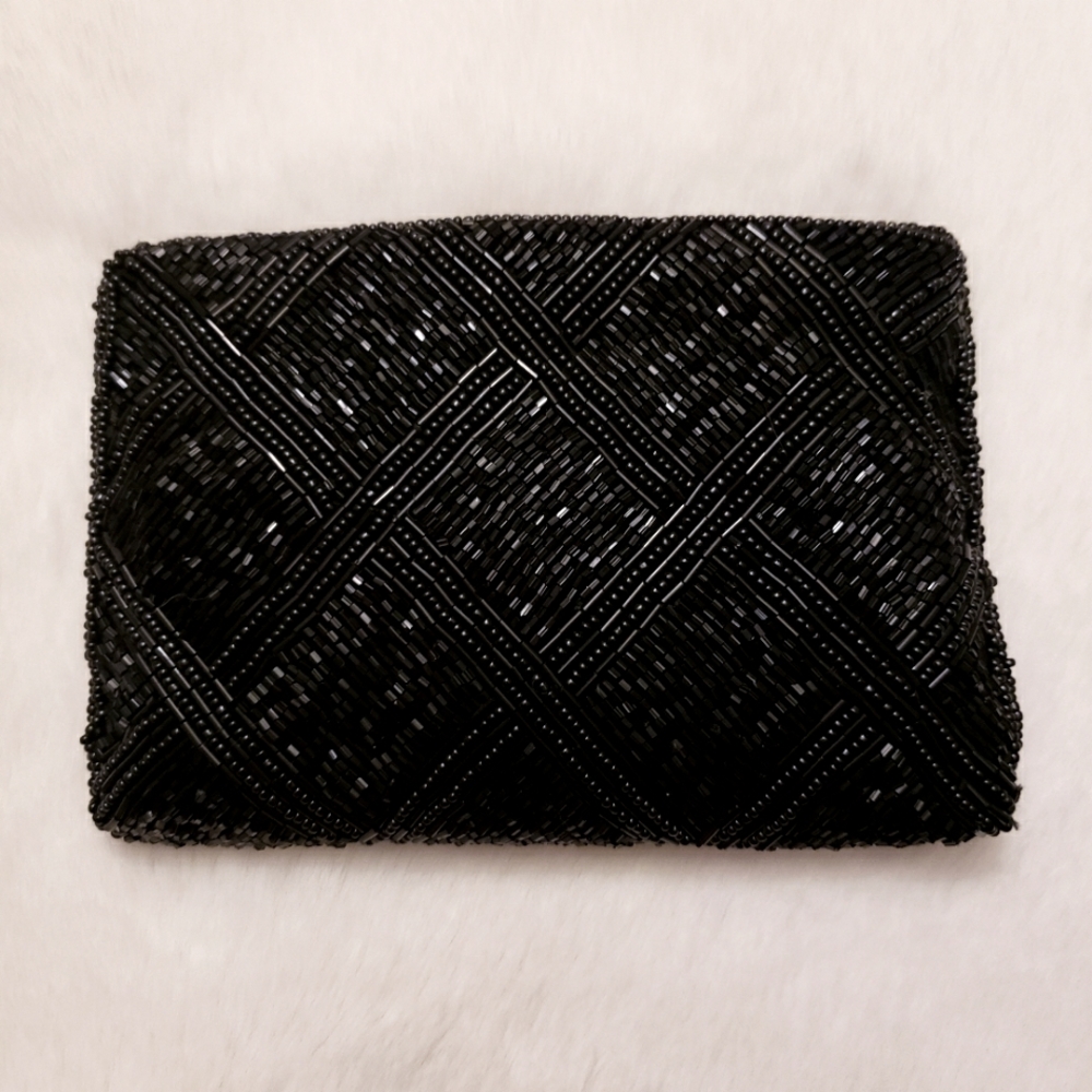 Lord and Taylor black beaded coin purse.